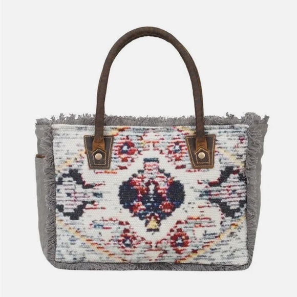 Myra Bag | Key Hole Woven Rug Fringy And Leather Tote Bag - Picture 15 of 15